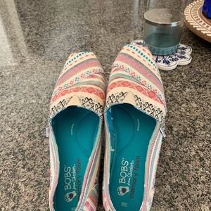 Size 8.5 Skechers slip ons